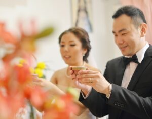 Young couple performing a traditional chinese wedding ritual