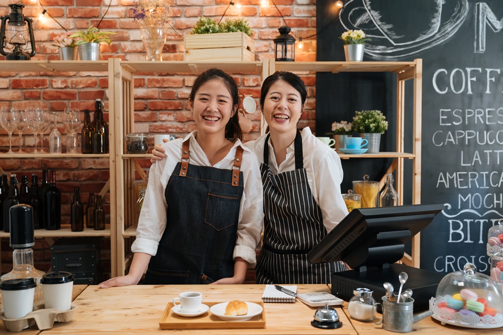 A photograph illustrating female SME startup business owners in Singapore using a business loan to boost their small business.