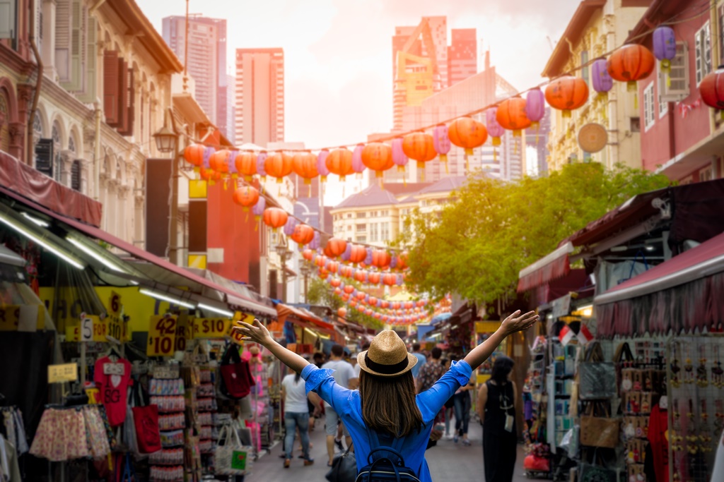 A young woman exploring the top things to see and do in Chinatown, Singapore