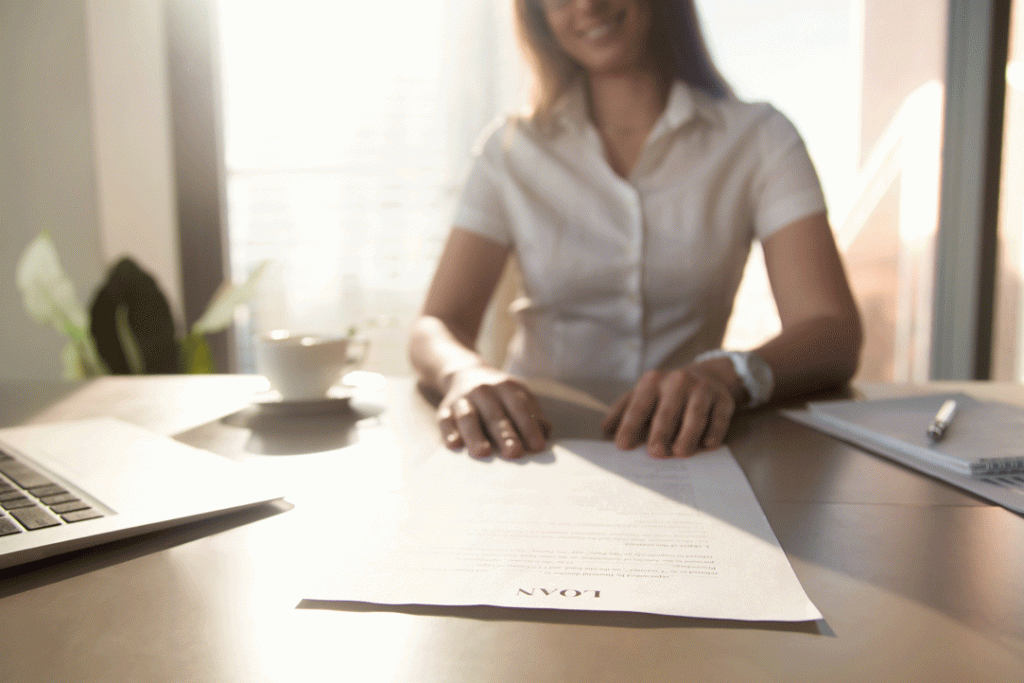 a female responsible borrower in singapore applies for a personal loan at a moneylender