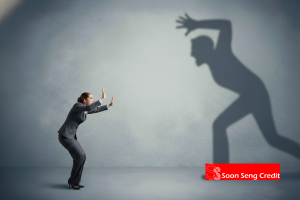 Where to get help for licensed money lender harassment in Singapore